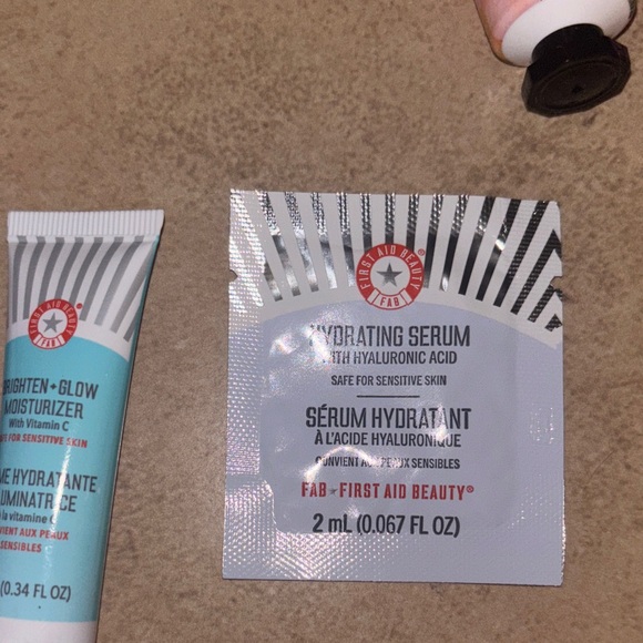 First Aid Beauty Skincare Collection with Teal Scrunchie nail file and cream bun - Picture 4 of 8